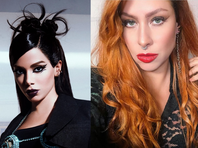 À esquerda, cantora Anitta vestida de preto em uma das cenas do seu novo clipe e dividindo a tela está a cantora Pitty do lado direito com cabelo ruivo e usando batom vermelho
